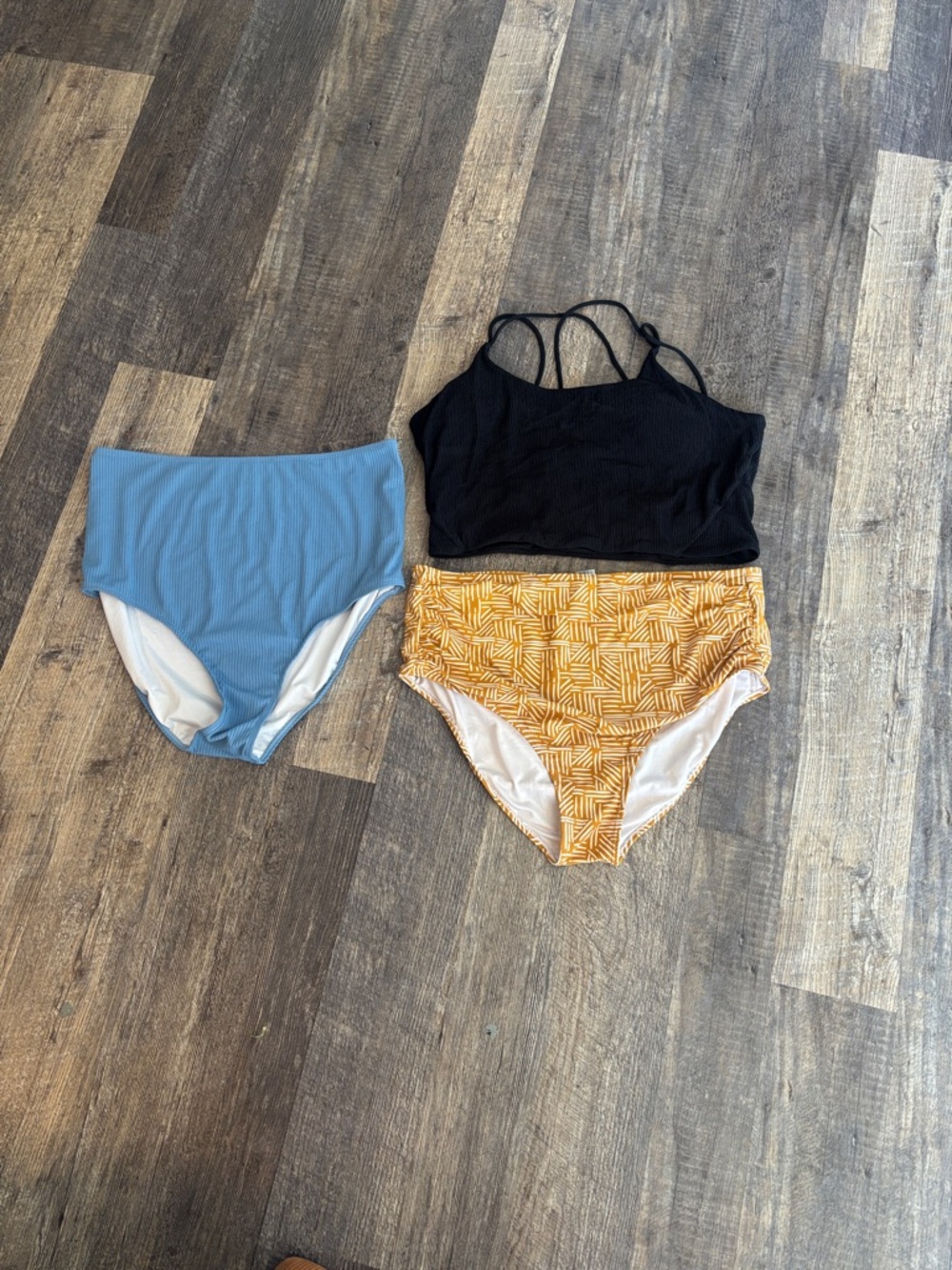 Black Strappy Bikini Top with Blue and Yellow High-Waist Bikini Bottoms